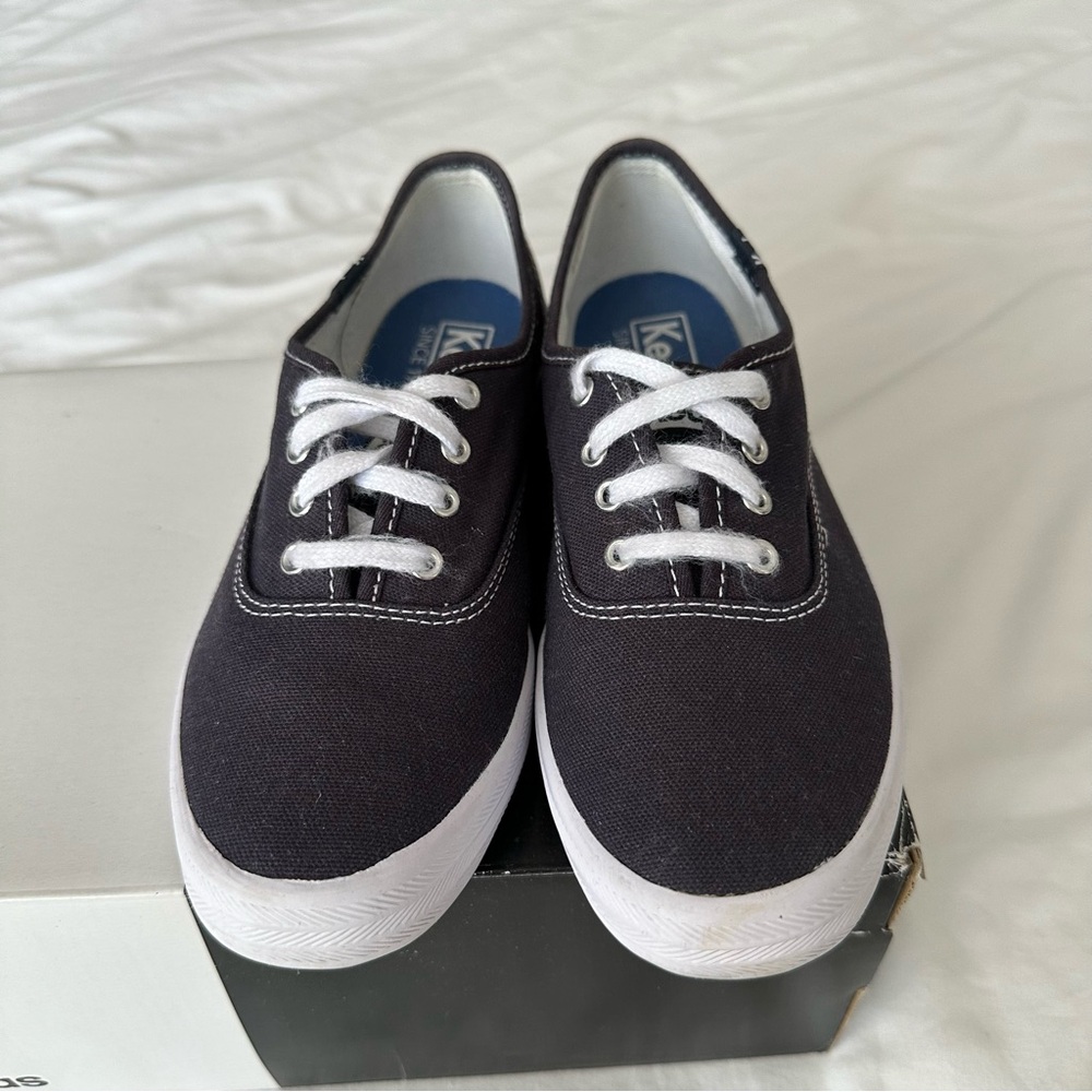 Keds Women's Champion Sneaker in navy (size 5)